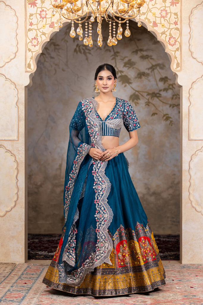 Teal blue  lehenga with heavy zari work blouse and dupatta